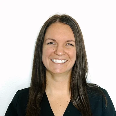 Chiropractic Allen TX Taylor Taylor smiling in a black shirt.